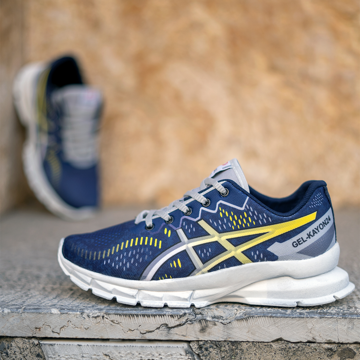 کفش مردانه اسیکس سرمه ای زرد مدل dahak