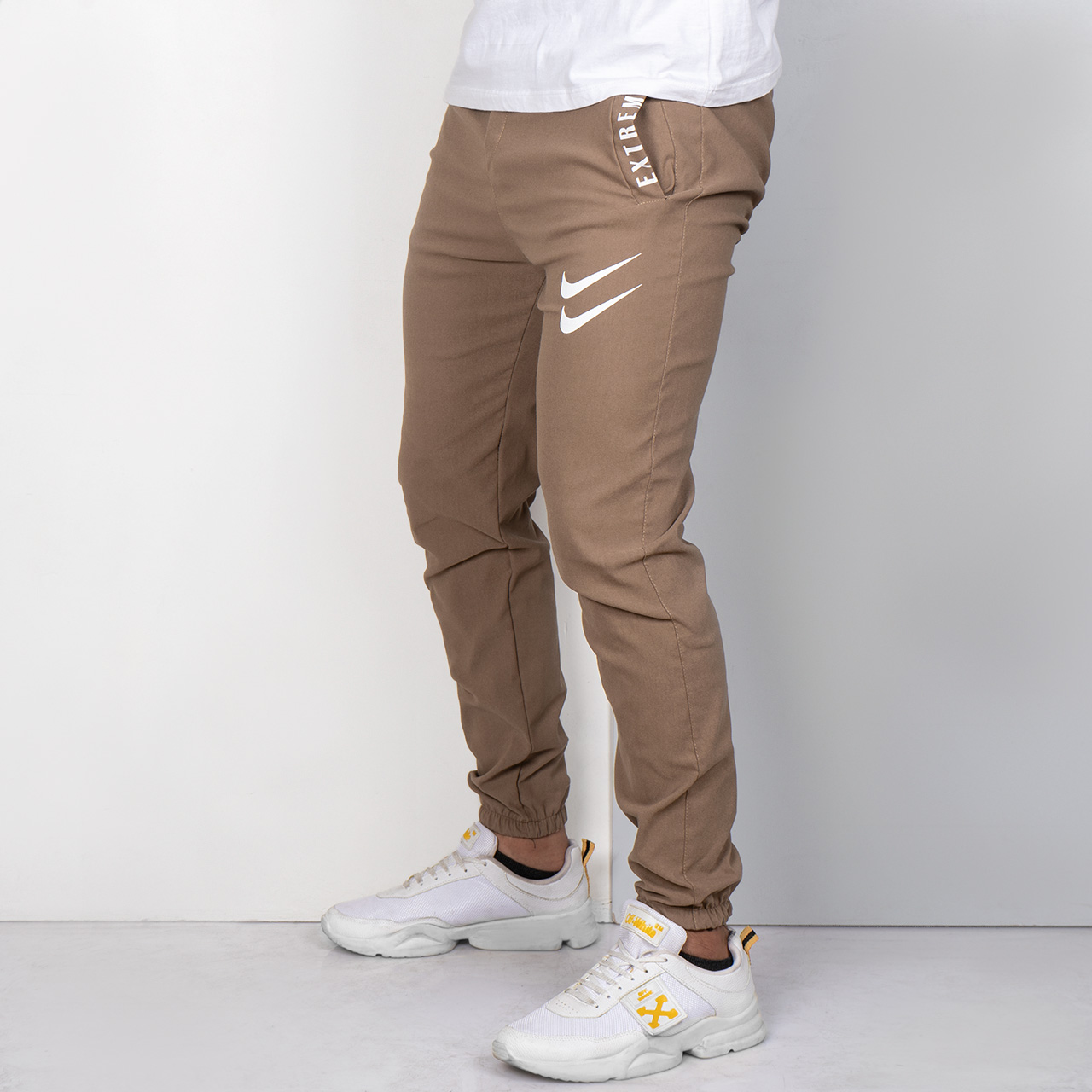 شلوار اسلش نایک کرم مردانه مدل manio