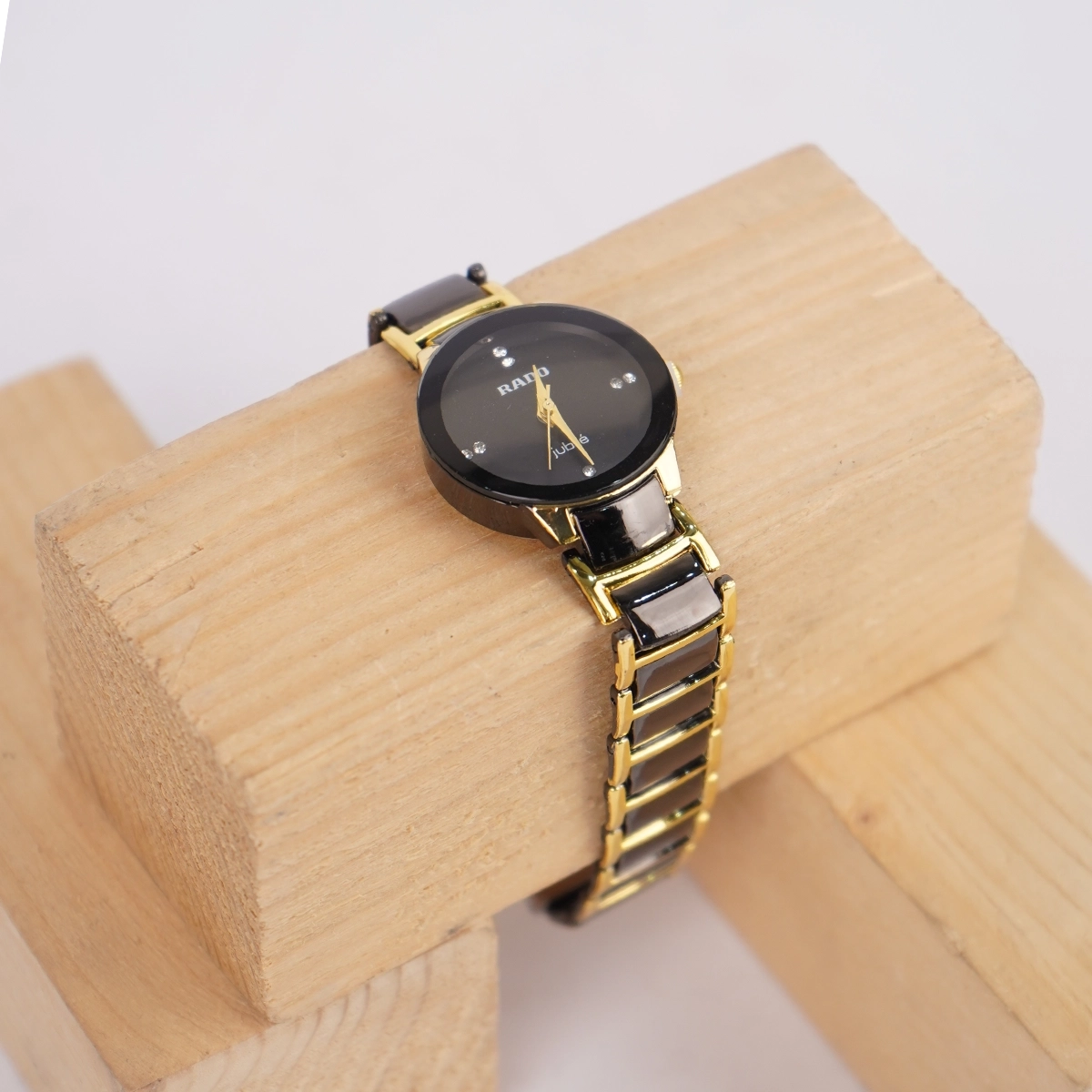 ساعت مشکی طلایی زنانه مدل Rado