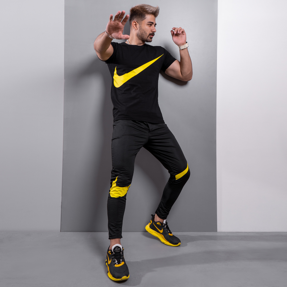 ست تیشرت شلوار نایک مشکی زرد مردانه مدل Baren